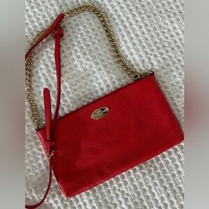 Red Coach Crossbody Leather Purse with gold hardware and chain